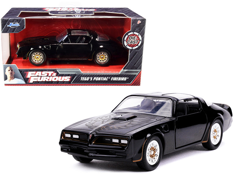 Tego's Pontiac Firebird Black with Gold Stripes and Hood Bird "Fast & Furious" Series 1/32 Diecast Model Car by Jada <h2>Tego's Jada</h2> <p>High-quality perfect for collectors enthusiasts. Features d