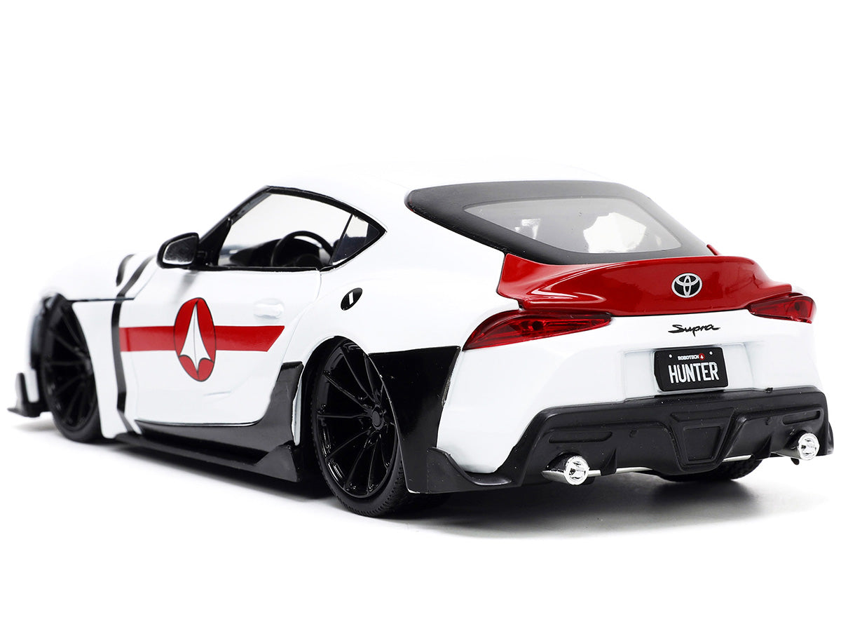 2020 Toyota Supra White and Rick Hunter Diecast Figurine "Robotech" "Hollywood Rides" Series 1/24 Model Car by Jada <h2>2020 Jada</h2> <p>High-quality perfect for collectors enthusiasts. Features deta