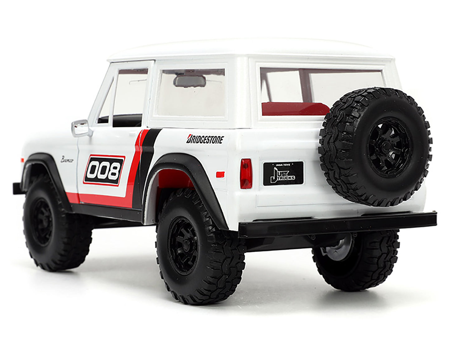 1973 Ford Bronco #008 White with Red and Black Stripes Interior Extra Wheels "Just Trucks" Series 1/24 Diecast Model Car by Jada <h2>1973 Jada</h2> <p>High-quality perfect for collectors enthusiasts.