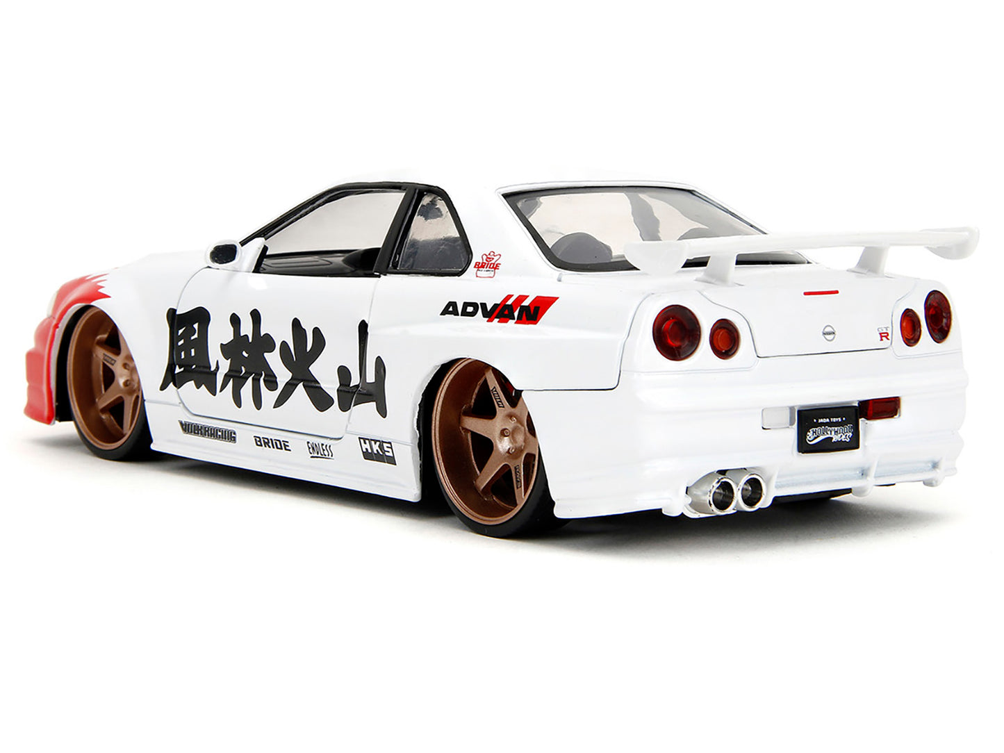 2002 Nissan Skyline GT-R (R34) RHD (Right Hand Drive) White with Red Graphics and Ryu Diecast Figure "Street Fighter" Video Game "Anime Hollywood Rides" Series 1/24 Model Car by Jada <h2>2002 Jada</h2