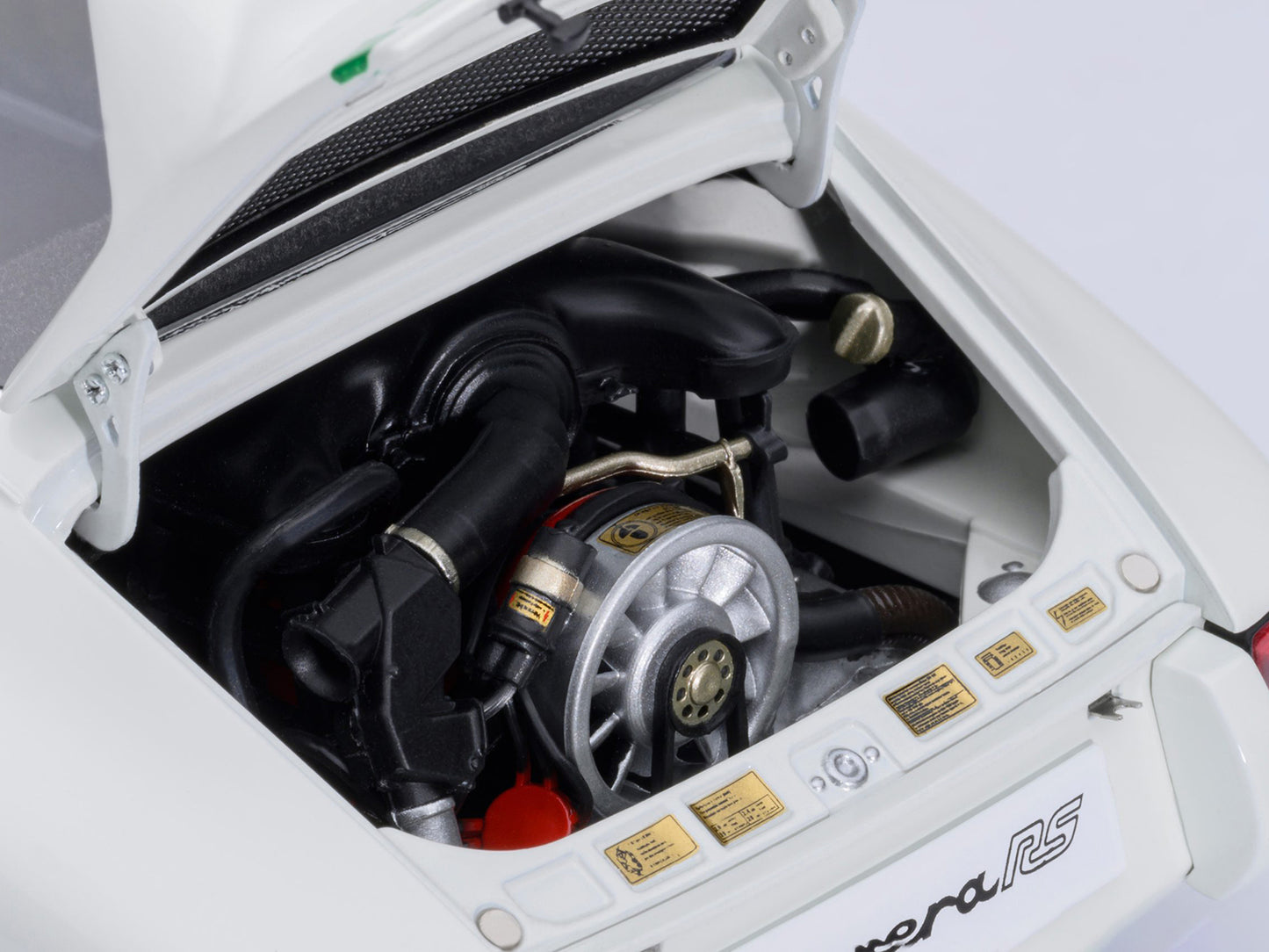 Porsche 911 Carrera 2.7 RS Grand Prix White with Green Stripes and Wheels 1/18 Model Car by Autoart <h2>Porsche Autoart</h2> <p>High-quality diecast perfect for collectors enthusiasts. Features detail