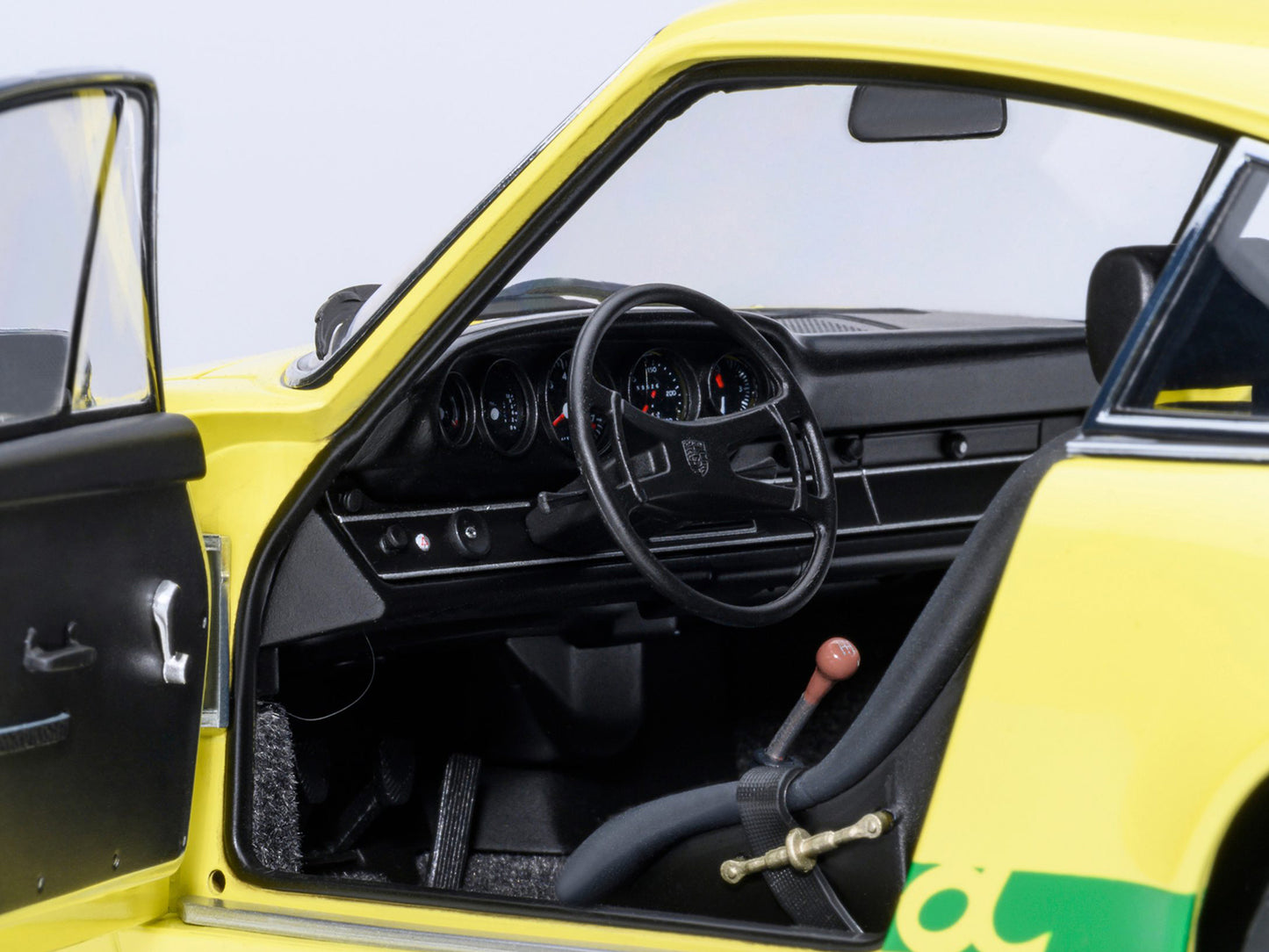 Porsche 911 Carrera 2.7 RS Light Yellow with Green Stripes and Wheels 1/18 Model Car by Autoart <h2>Porsche Autoart</h2> <p>High-quality diecast perfect for collectors enthusiasts. Features detailed i