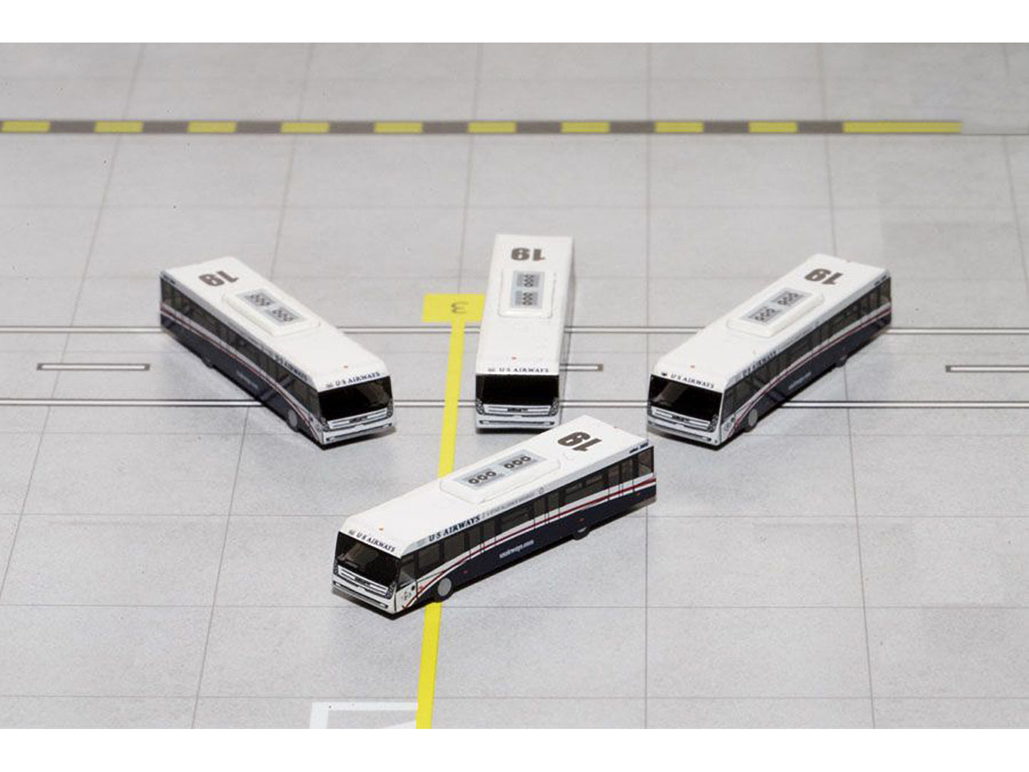 Cobus 3000 Passenger Bus White and Blue "US Airways Shuttle Bus" 4 Piece Set 1/400 Diecast Models by GeminiJets <h2>Cobus GeminiJets</h2> <p>High-quality model car perfect for collectors enthusiasts.