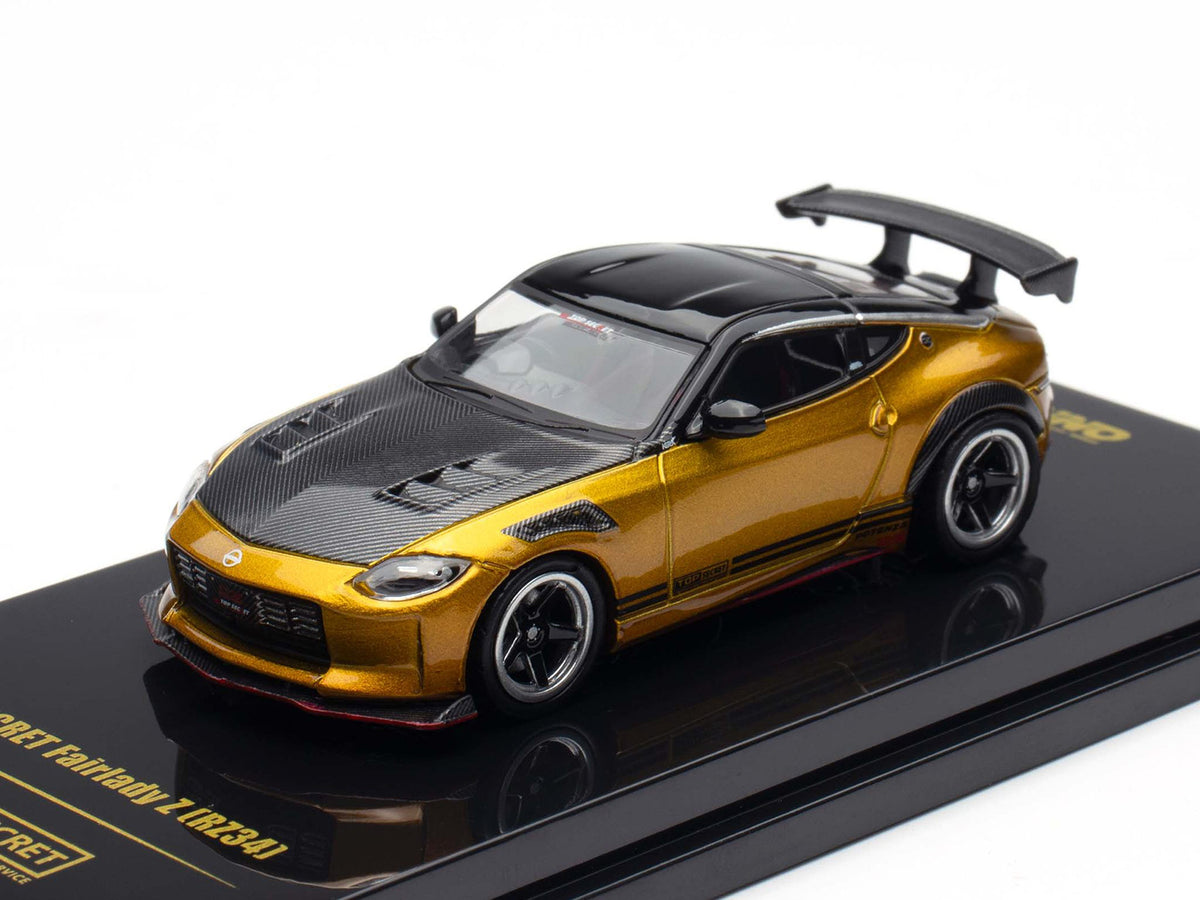 Nissan Fairlady Z Top Secret (RZ34) RHD (Right Hand Drive) Gold Metallic with Carbon Hood and Black Top 1/64 Diecast Model Car by Inno Models