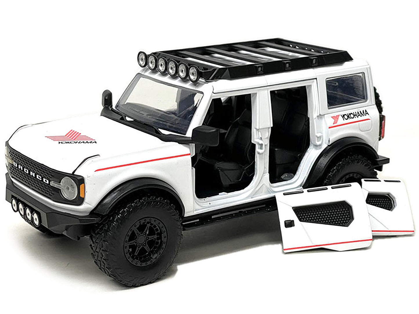 2021 Ford Bronco White with Red Stripes and Roof Rack "Yokohama Tires" "Just Trucks" Series 1/24 Diecast Model Car by Jada <h2>2021 Jada</h2> <p>High-quality perfect for collectors enthusiasts. Featur
