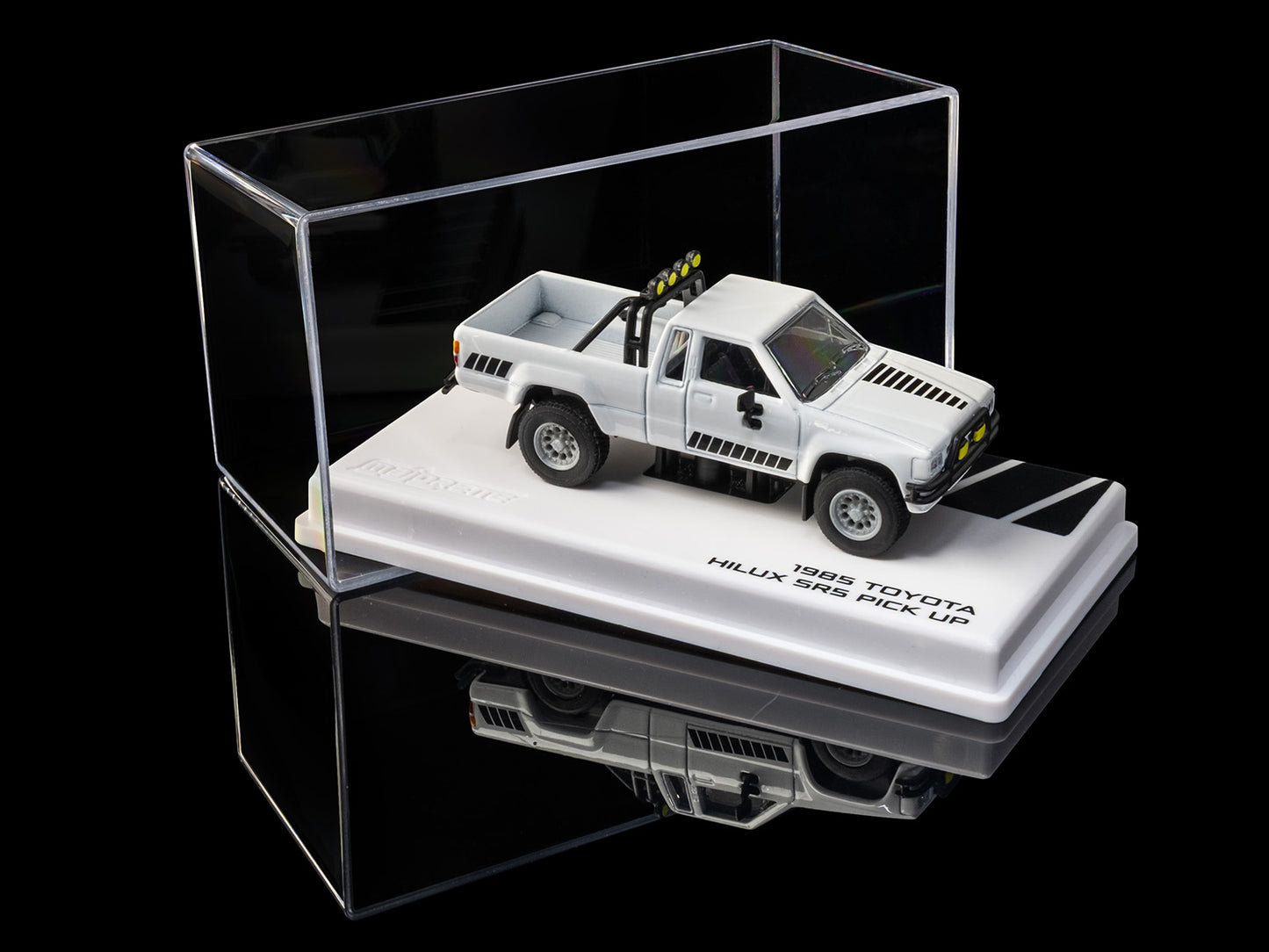 1985 Toyota Hilux SR5 Pickup Truck White with Black Graphics "Collection" Series 1/64 Diecast Model Car by Majorette