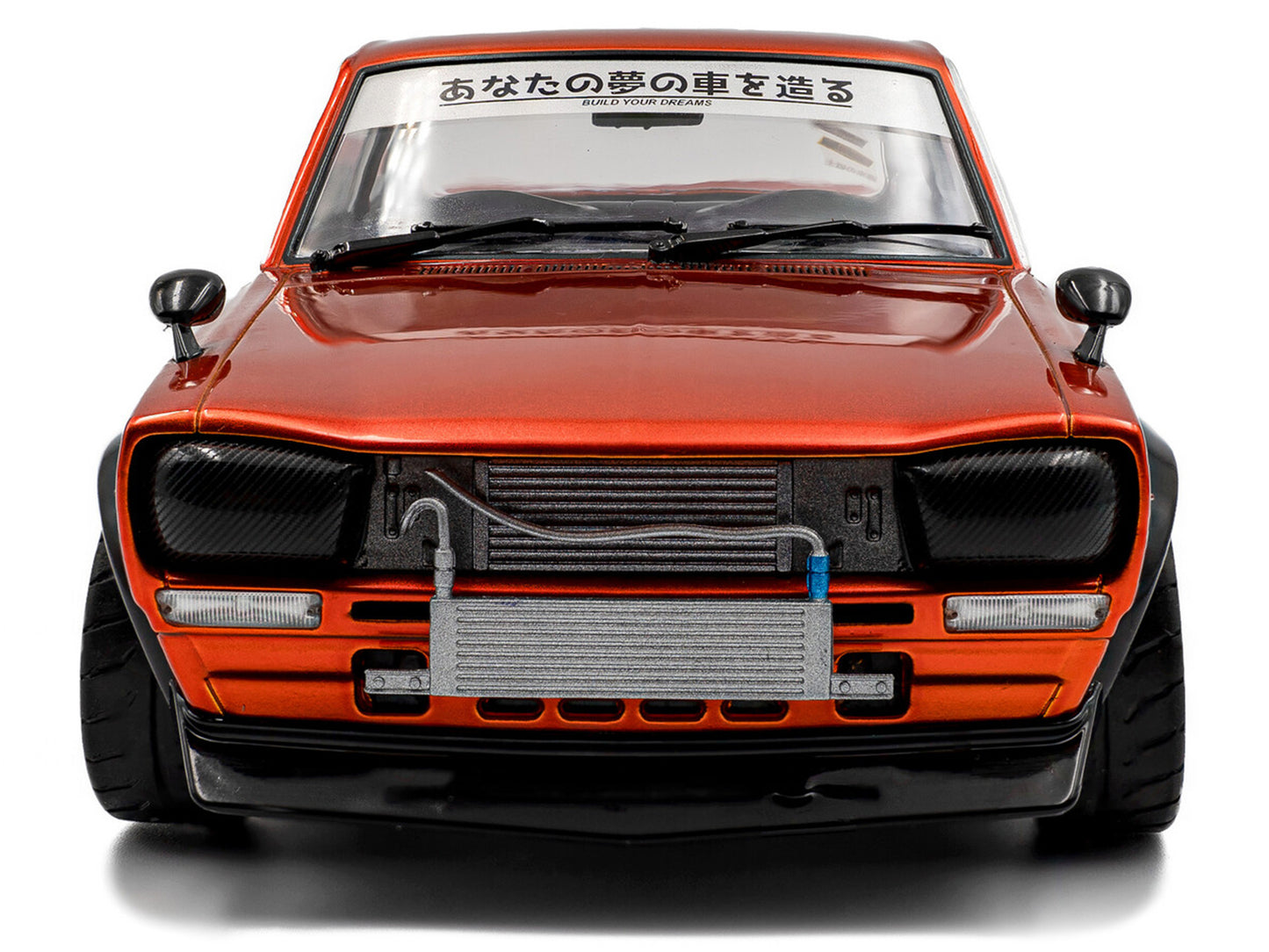 1970 Nissan Skyline (C10) Hakosuka RHD (Right Hand Drive) Orange Metallic 1/18 Diecast Model Car by Solido