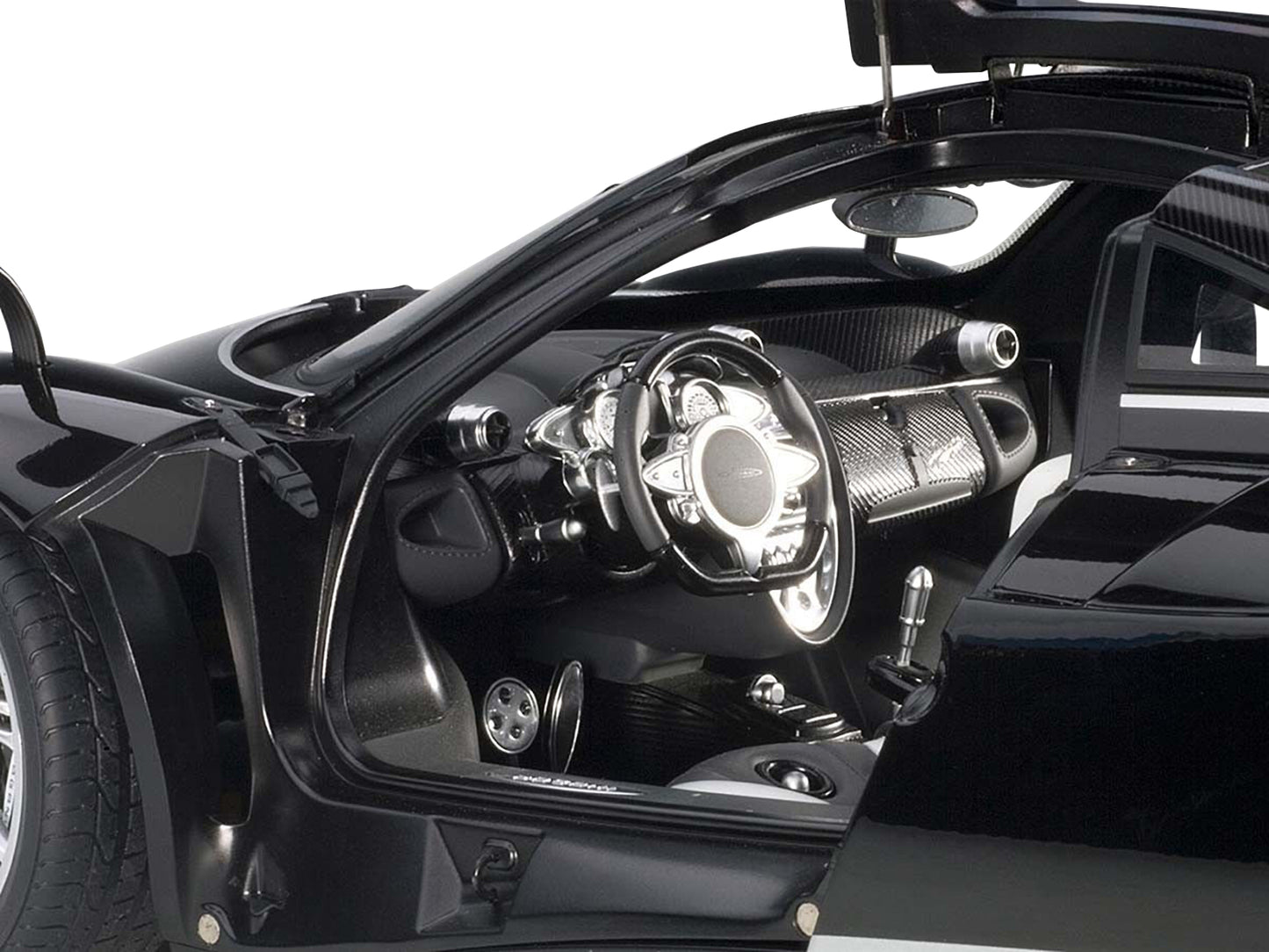 Pagani Huayra Gloss Black with Silver Stripes and Wheels 1/12 Model Car by Autoart <h2>Pagani Autoart</h2> <p>High-quality diecast perfect for collectors enthusiasts. Features detailed interior exteri
