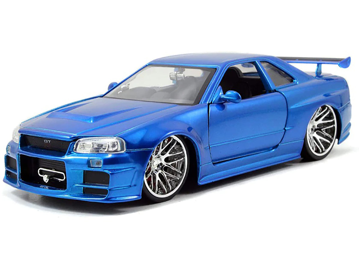 Brian's Nissan GTR Skyline R34 RHD (Right Hand Drive) Blue 25th Anniversary "Fast & Furious" Movie 1/24 Diecast Model Car by Jada