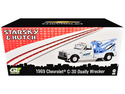 GreenLight 1969 Chevrolet C-30 Dually Wrecker Tow Truck "Roscoe Service" White "Starsky and Hutch" (1975-1979) TV Series 1/18 Diecast Model Car by <h2>1969 Greenlight</h2> <p>High-quality perfect for