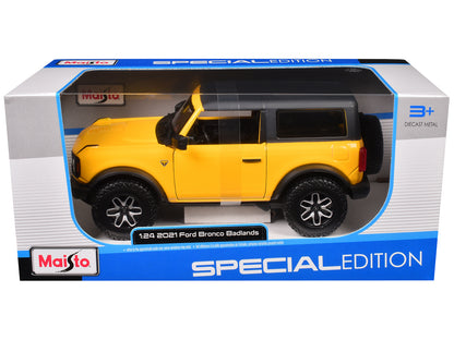 Maisto 2021 Ford Bronco Badlands Yellow with Black Top "Special Edition" 1/24 Diecast Model Car by <h2>2021 Maisto</h2> <p>High-quality perfect for collectors and enthusiasts. Features detailed interi