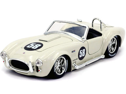 1965 Shelby Cobra 427 S/C #58 Cream "Bigtime Muscle" 1/24 Diecast Model Car by Jada <h2>1965 Jada</h2> <p>High-quality perfect for collectors and enthusiasts. Features detailed interior exterior craft