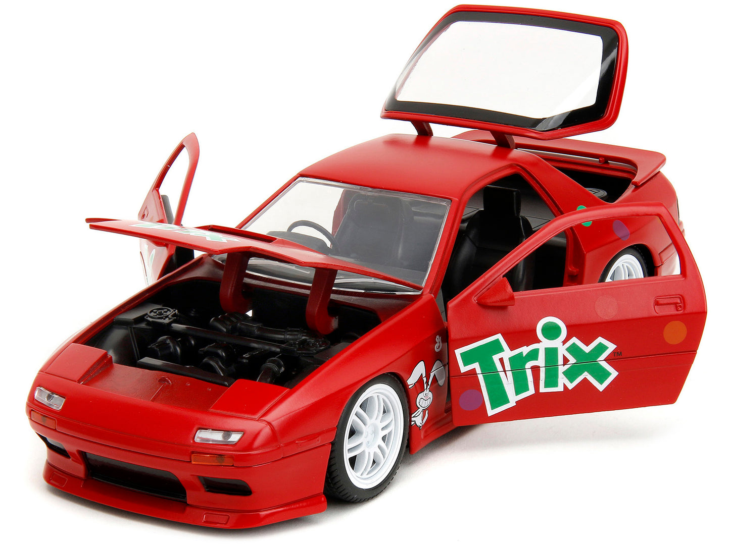 1985 Mazda RX-7 RHD (Right Hand Drive) Red with Graphics and Trix Rabbit Diecast Figure "Trix Cereal" "Hollywood Rides" Series 1/24 Model Car by Jada <h2>1985 Jada</h2> <p>High-quality perfect for col