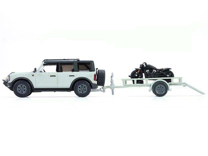 GreenLight 2021 Ford Bronco 4-Door Badlands Cactus Gray with Black Top and Motorcycle Utility Trailer "Hitch & Tow" Series 33 1/64 Diecast Model Cars by <h2>2021 Greenlight</h2> <p>High-quality car pe