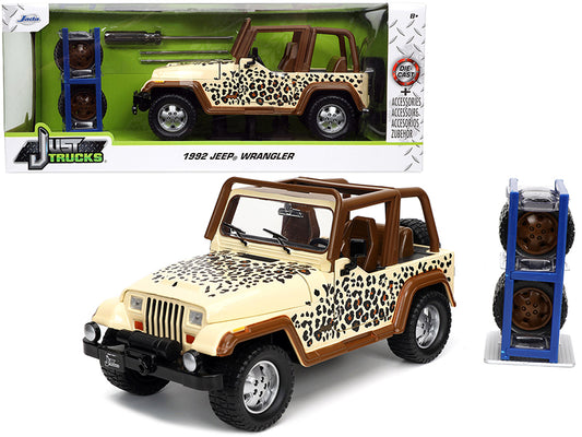 1992 Jeep Wrangler Tan and Brown with Graphics Extra Wheels "Just Trucks" Series 1/24 Diecast Model Car by Jada <h2>1992 Jada</h2> <p>High-quality perfect for collectors enthusiasts. Features detailed