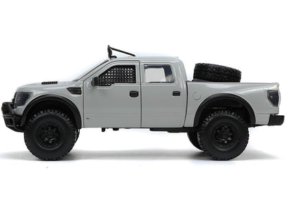 2011 Ford F-150 SVT Raptor Pickup Truck Light Gray with Extra Wheels "Just Trucks" Series 1/24 Diecast Model Car by Jada <h2>2011 Jada</h2> <p>High-quality perfect for collectors and enthusiasts. Feat