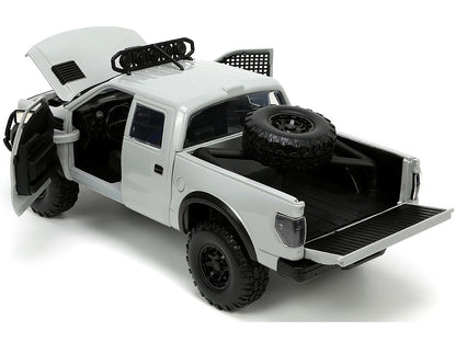 2011 Ford F-150 SVT Raptor Pickup Truck Light Gray with Extra Wheels "Just Trucks" Series 1/24 Diecast Model Car by Jada <h2>2011 Jada</h2> <p>High-quality perfect for collectors and enthusiasts. Feat