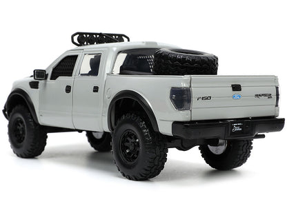 2011 Ford F-150 SVT Raptor Pickup Truck Light Gray with Extra Wheels "Just Trucks" Series 1/24 Diecast Model Car by Jada <h2>2011 Jada</h2> <p>High-quality perfect for collectors and enthusiasts. Feat