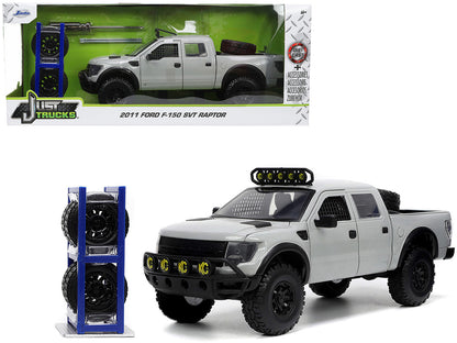 2011 Ford F-150 SVT Raptor Pickup Truck Light Gray with Extra Wheels "Just Trucks" Series 1/24 Diecast Model Car by Jada <h2>2011 Jada</h2> <p>High-quality perfect for collectors and enthusiasts. Feat