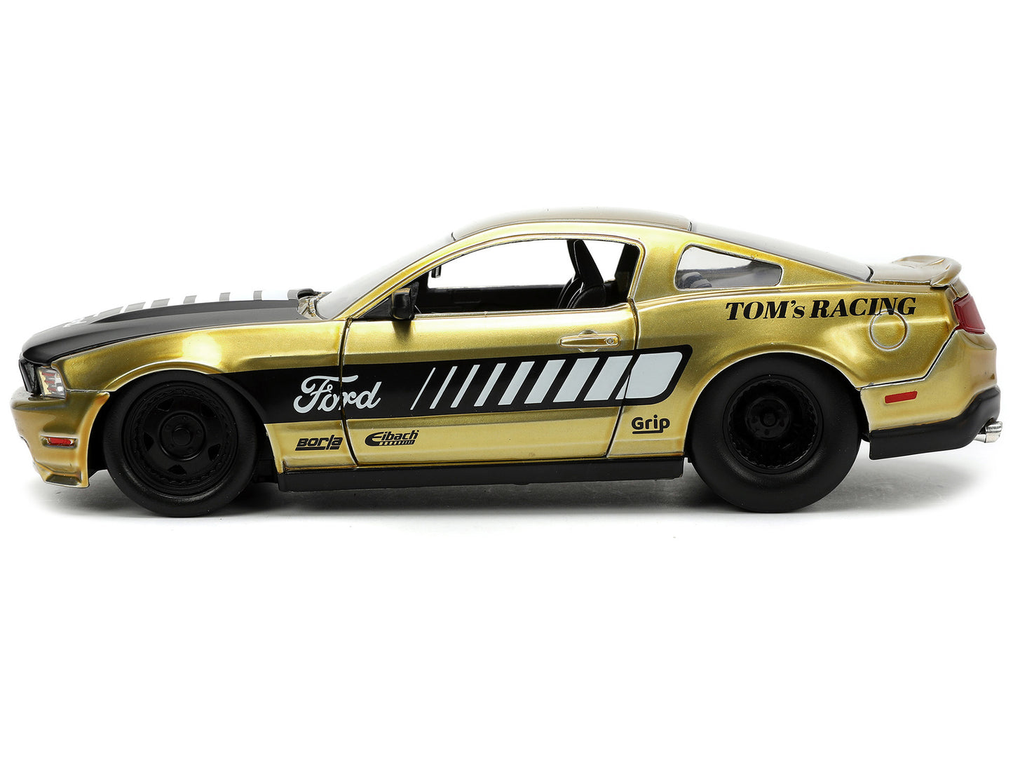 2010 Ford Mustang GT Gold Metallic with Black Graphics and Hood "Tom's Racing" "Bigtime Muscle" Series 1/24 Diecast Model Car by Jada <h2>2010 Jada</h2> <p>High-quality perfect for collectors enthusia