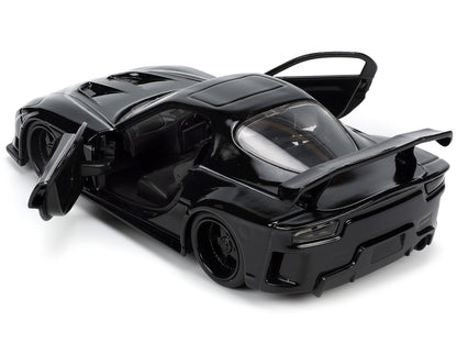 1995 Mazda RX-7 RHD (Right Hand Drive) Black and Panther Diecast Figure "The Avengers" "Hollywood Rides" Series 1/32 Model Car by Jada <h2>1995 Jada</h2> <p>High-quality perfect for collectors enthusi