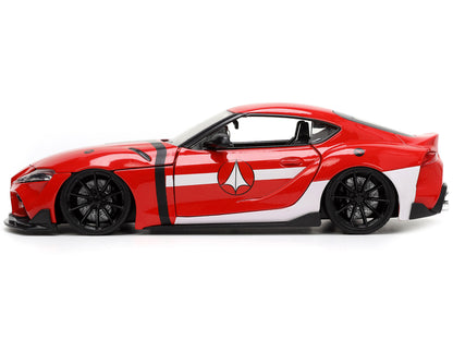 2020 Toyota Supra Red with Graphics and Miriya Sterling Diecast Figurine "Robotech" "Hollywood Rides" Series 1/24 Model Car by Jada <h2>2020 Jada</h2> <p>High-quality perfect for collectors enthusiast