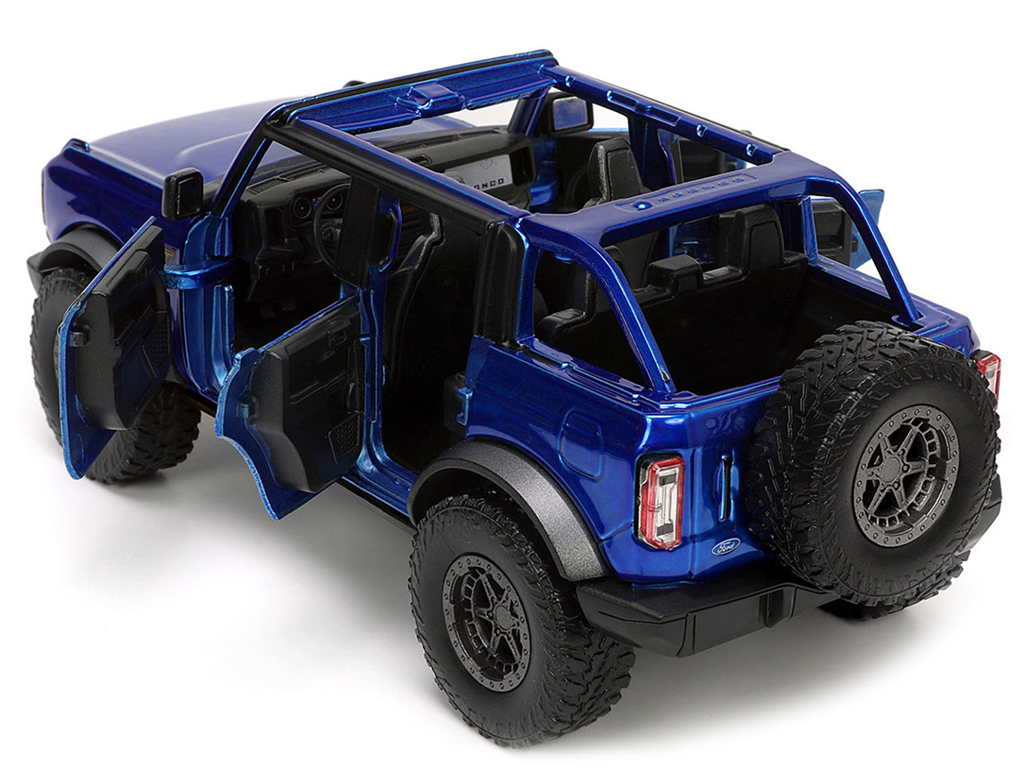 2021 Ford Bronco Open-Top Candy Blue Metallic with Extra Wheels "Just Trucks" Series 1/24 Diecast Model Car by Jada <h2>2021 Jada</h2> <p>High-quality perfect for collectors and enthusiasts. Features