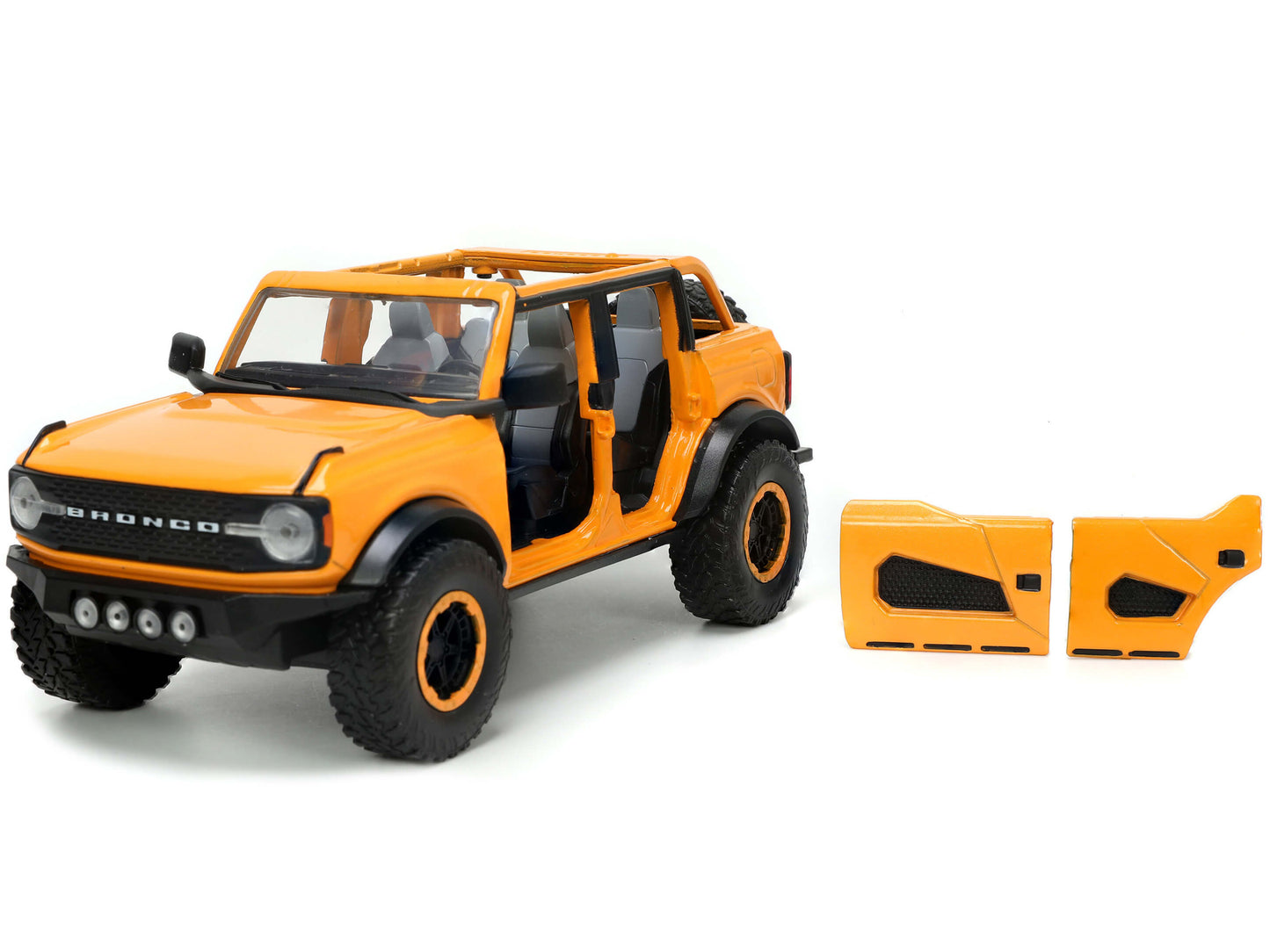 2021 Ford Bronco Orange Metallic with Extra Wheels "Just Trucks" Series 1/24 Diecast Model Car by Jada <h2>2021 Jada</h2> <p>High-quality perfect for collectors and enthusiasts. Features detailed inte