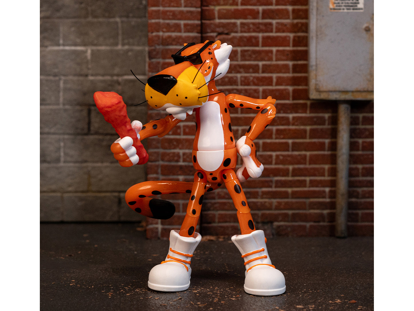 Chester Cheetah 5.5" Glow-in-the-Dark Figure with Accessories and Alternate Head Hands "Flamin' Hot Cheetos Crunchy" Model by Jada <h2>Chester Jada</h2> <p>High-quality diecast car perfect for collect