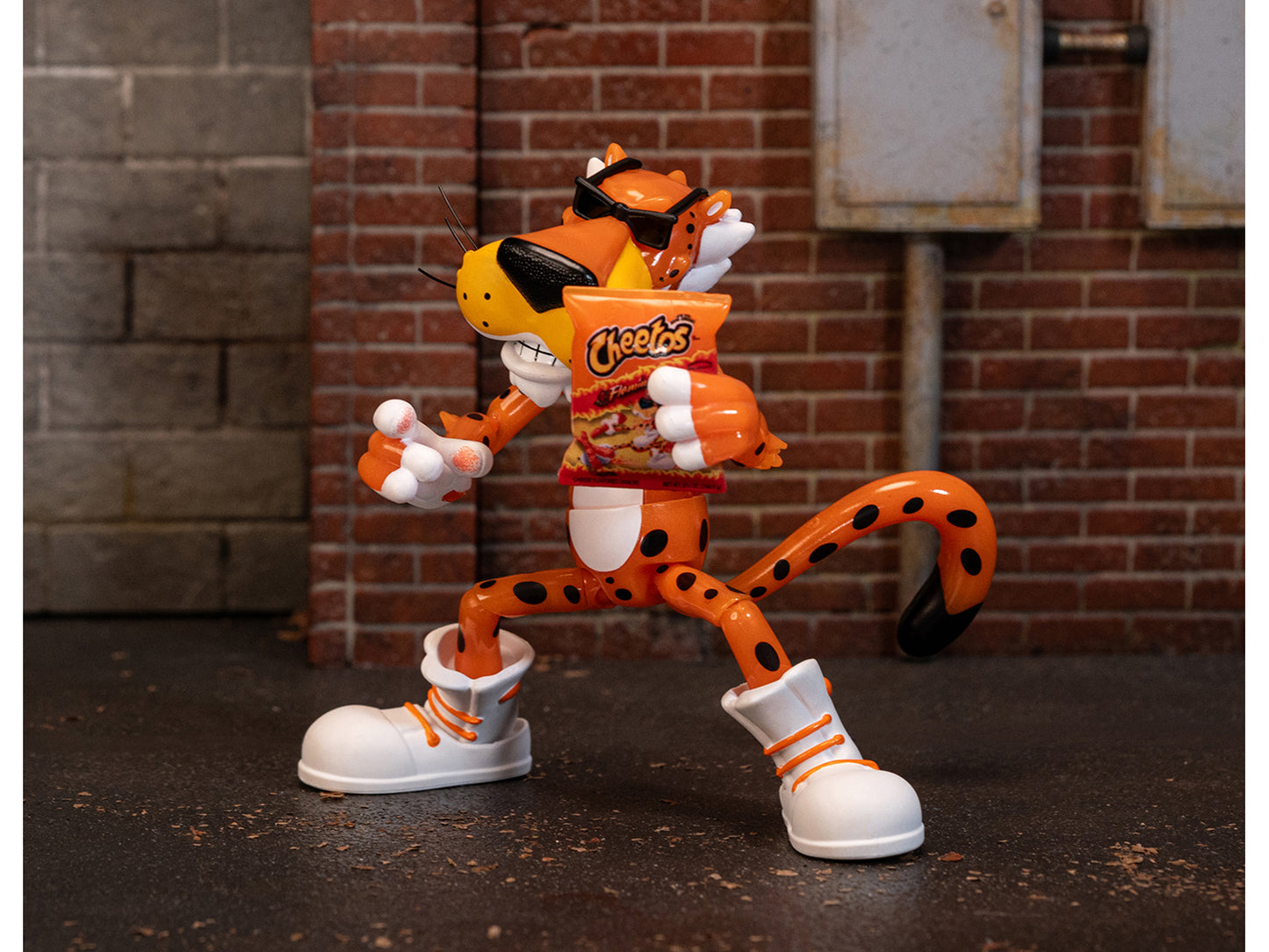 Chester Cheetah 5.5" Glow-in-the-Dark Figure with Accessories and Alternate Head Hands "Flamin' Hot Cheetos Crunchy" Model by Jada <h2>Chester Jada</h2> <p>High-quality diecast car perfect for collect