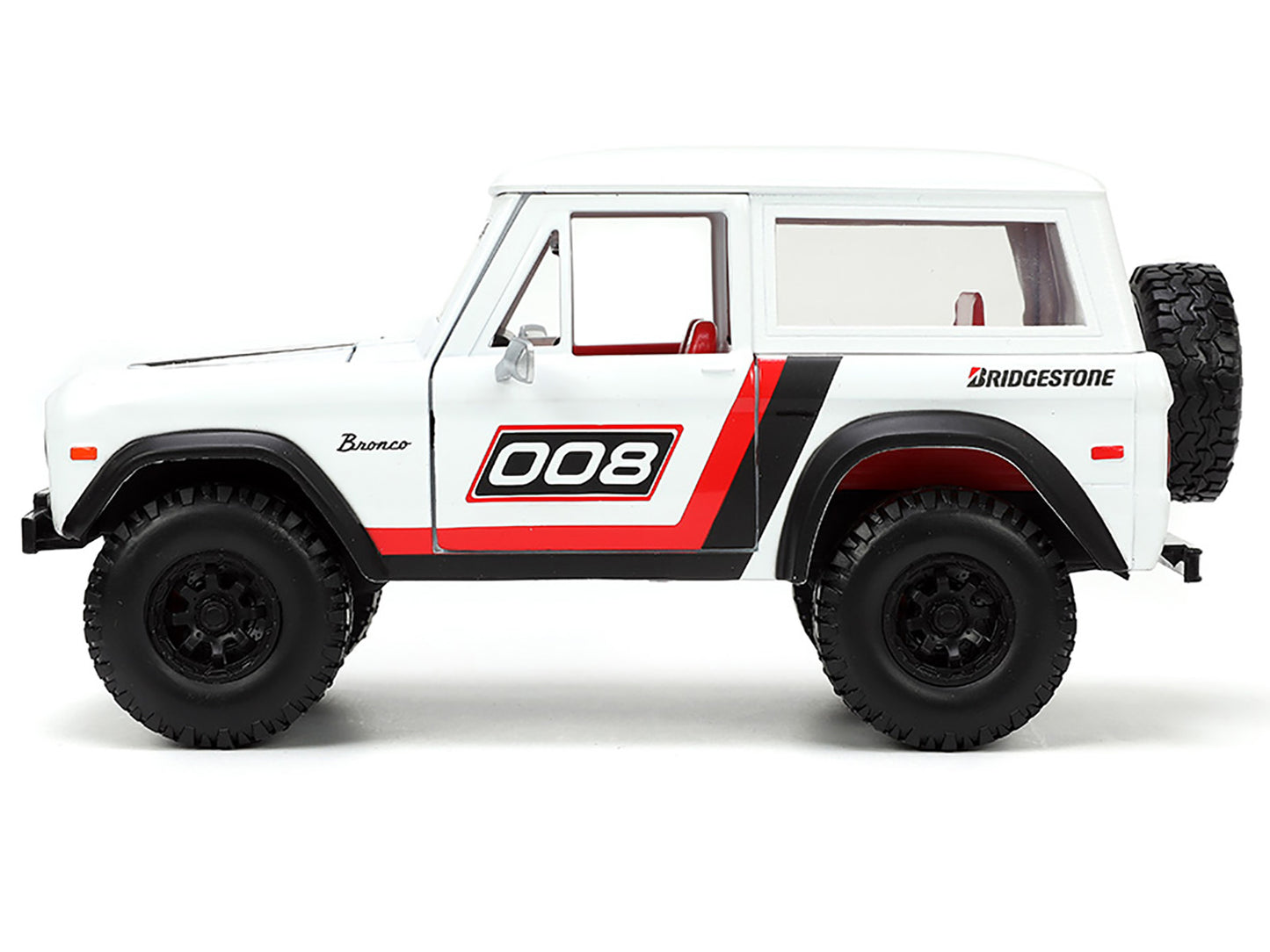 1973 Ford Bronco #008 White with Red and Black Stripes Interior Extra Wheels "Just Trucks" Series 1/24 Diecast Model Car by Jada <h2>1973 Jada</h2> <p>High-quality perfect for collectors enthusiasts.