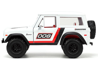 1973 Ford Bronco #008 White with Red and Black Stripes Interior Extra Wheels "Just Trucks" Series 1/24 Diecast Model Car by Jada <h2>1973 Jada</h2> <p>High-quality perfect for collectors enthusiasts.