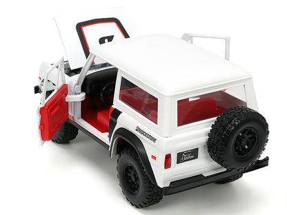1973 Ford Bronco #008 White with Red and Black Stripes Interior Extra Wheels "Just Trucks" Series 1/24 Diecast Model Car by Jada <h2>1973 Jada</h2> <p>High-quality perfect for collectors enthusiasts.