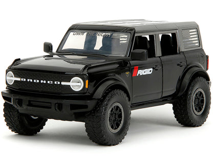 2021 Ford Bronco Badlands Black "Rigid" with Extra Wheels "Just Trucks" Series 1/24 Diecast Model Car by Jada <h2>2021 Jada</h2> <p>High-quality perfect for collectors and enthusiasts. Features detail