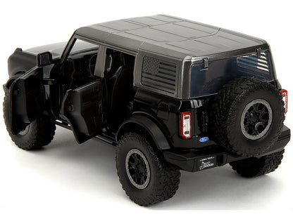 2021 Ford Bronco Badlands Black "Rigid" with Extra Wheels "Just Trucks" Series 1/24 Diecast Model Car by Jada <h2>2021 Jada</h2> <p>High-quality perfect for collectors and enthusiasts. Features detail