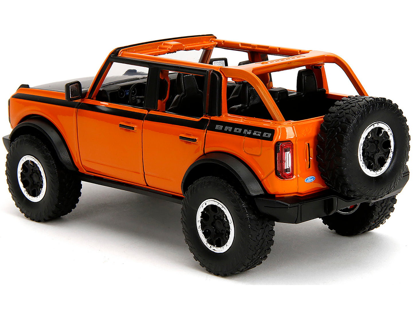 2021 Ford Bronco Open-Top Orange with Black Stripes and Hood Extra Wheels "Just Trucks" Series 1/24 Diecast Model Car by Jada <h2>2021 Jada</h2> <p>High-quality perfect for collectors enthusiasts. Fea