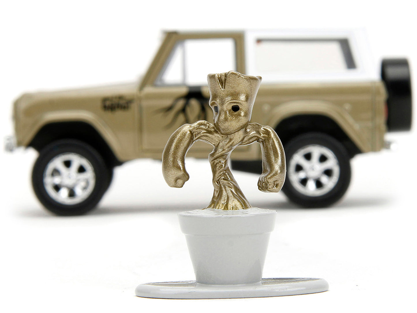 1973 Ford Bronco Gold Metallic with White Top and Groot Diecast Figure "Guardians of the Galaxy" "Marvel" Series 1/32 Model Car by Jada <h2>1973 Jada</h2> <p>High-quality perfect for collectors enthus