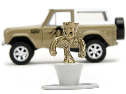 1973 Ford Bronco Gold Metallic with White Top and Groot Diecast Figure "Guardians of the Galaxy" "Marvel" Series 1/32 Model Car by Jada <h2>1973 Jada</h2> <p>High-quality perfect for collectors enthus
