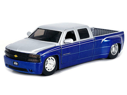 1999 Chevrolet Silverado Dually Pickup Truck Blue Metallic and Silver with Stock Wheels "Just Trucks" Series 1/24 Diecast Model Car by Jada <h2>1999 Jada</h2> <p>High-quality perfect for collectors en