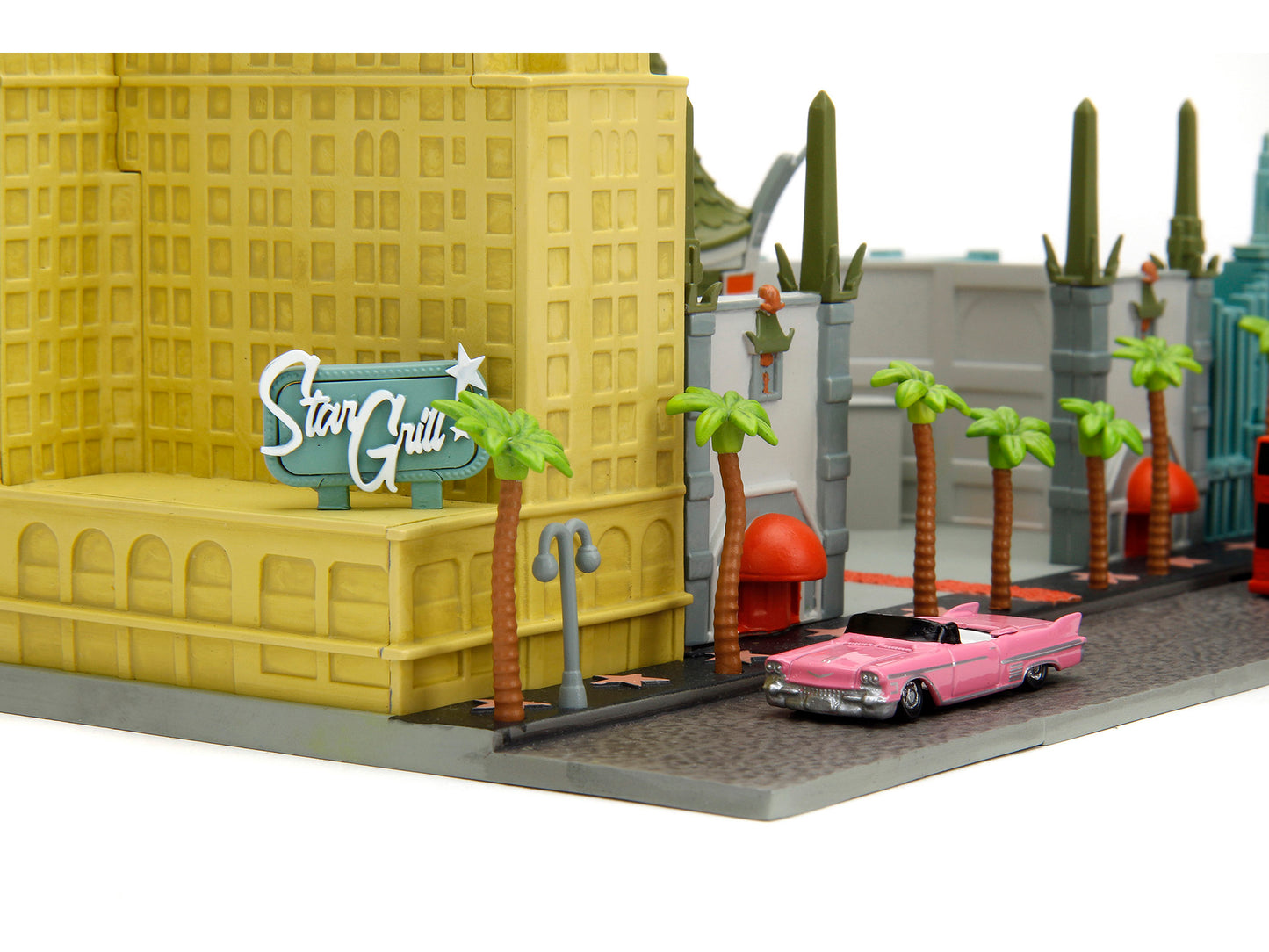 "Hollywood 100" Walk of Fame Diorama with Pink Convertible and Double-Decker Bus "Nano Scene" Series model by Jada <h2>"Hollywood Jada</h2> <p>High-quality diecast car perfect for collectors enthusias