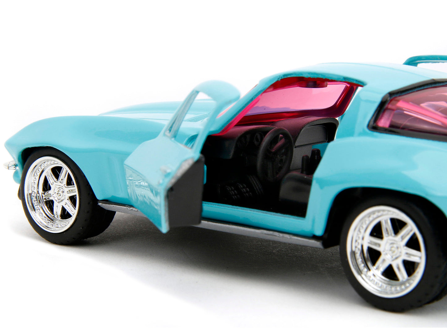 1966 Chevrolet Corvette Light Blue with Pink Tinted Windows "Pink Slips" Series 1/32 Diecast Model Car by Jada <h2>1966 Jada</h2> <p>High-quality perfect for collectors and enthusiasts. Features detai