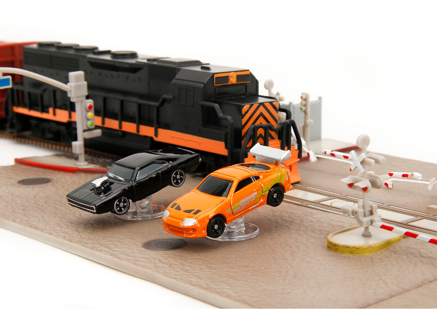 "Fast & Furious" Final Race Diorama with Toyota Supra Orange and Dodge Charger Black "Nano Scene" Series model by Jada <h2>"Fast Jada</h2> <p>High-quality diecast car perfect for collectors enthusiast