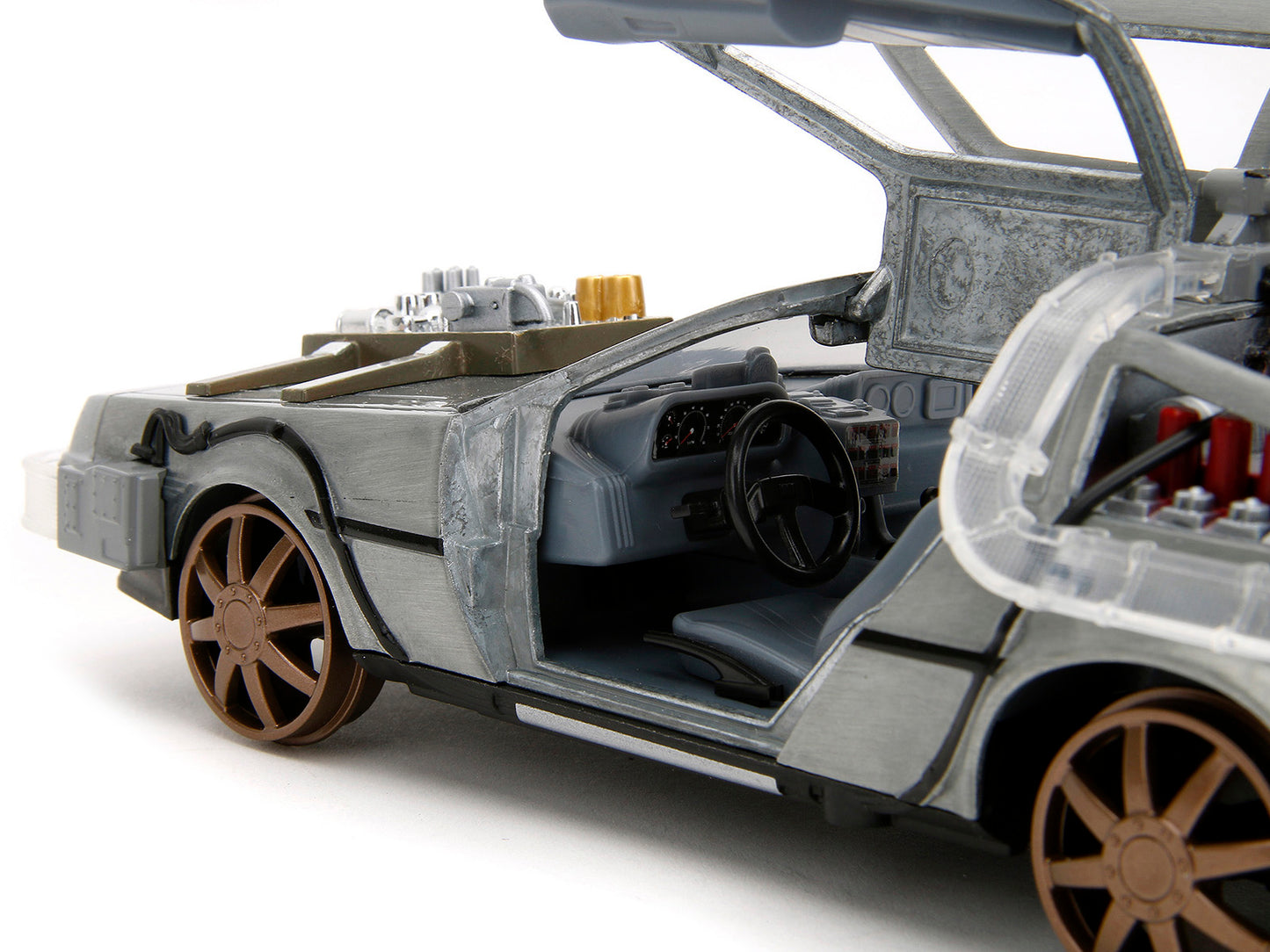 DeLorean Brushed Metal Time Machine (Train Wheel Version) with Lights "Back to the Future Part III" (1990) Movie "Hollywood Rides" Series 1/24 Diecast Model Car by Jada <h2>DeLorean Jada</h2> <p>High-