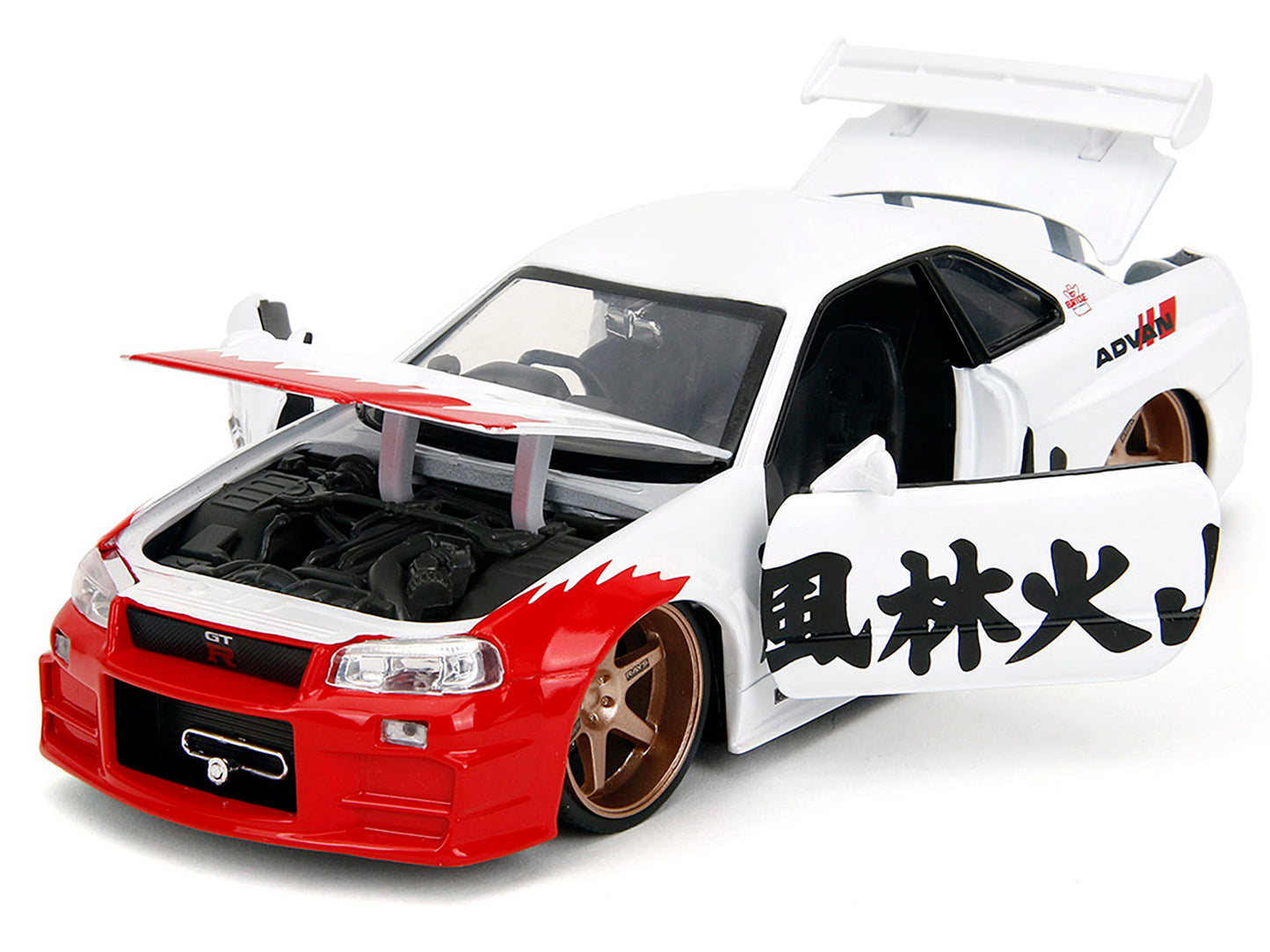 2002 Nissan Skyline GT-R (R34) RHD (Right Hand Drive) White with Red Graphics and Ryu Diecast Figure "Street Fighter" Video Game "Anime Hollywood Rides" Series 1/24 Model Car by Jada <h2>2002 Jada</h2