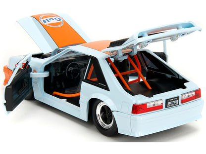 1989 Ford Mustang GT "Gulf Oil" Light Blue with Orange Stripe "Bigtime Muscle" Series 1/24 Diecast Model Car by Jada <h2>1989 Jada</h2> <p>High-quality perfect for collectors and enthusiasts. Features