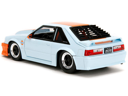 1989 Ford Mustang GT "Gulf Oil" Light Blue with Orange Stripe "Bigtime Muscle" Series 1/24 Diecast Model Car by Jada <h2>1989 Jada</h2> <p>High-quality perfect for collectors and enthusiasts. Features