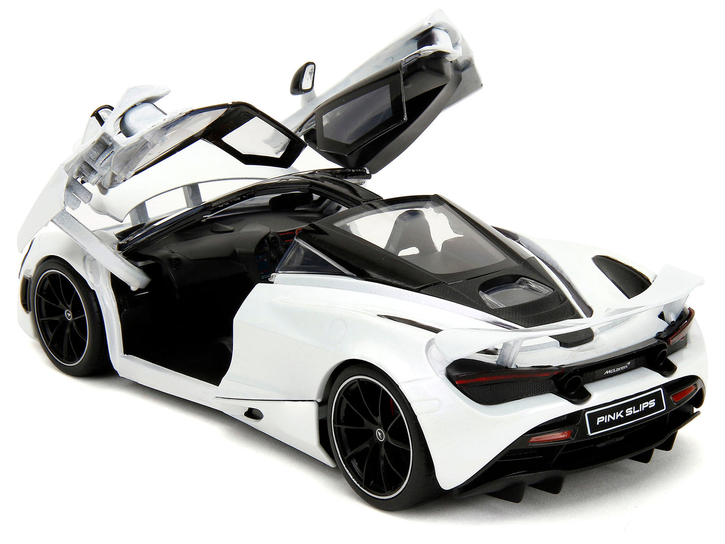 McLaren 720S White Metallic with Black Top "Pink Slips" Series 1/24 Diecast Model Car by Jada <h2>McLaren Jada</h2> <p>High-quality perfect for collectors and enthusiasts. Features detailed interior e