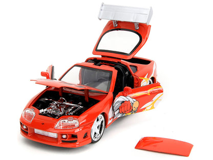 1995 Toyota Supra Red with Graphics and Saitama Diecast Figure "One Punch Man" (2015-2019) TV Series 1/24 Model by Jada <h2>1995 Jada</h2> <p>High-quality car perfect for collectors enthusiasts. Featu