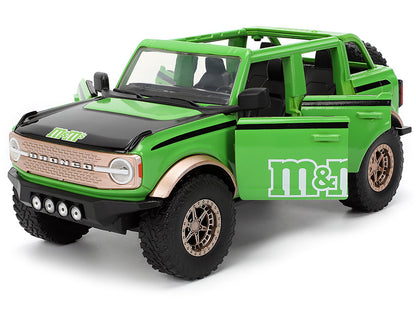 2021 Ford Bronco Green with Black Stripes and M&M's Diecast Figure "Hollywood Rides" Series 1/24 Model Car by Jada <h2>2021 Jada</h2> <p>High-quality perfect for collectors enthusiasts. Features detai
