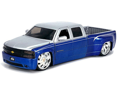 1999 Chevrolet Silverado Dually Pickup Truck Blue Metallic and Silver with Custom KMC Wheels "Just Trucks" Series 1/24 Diecast Model Car by Jada <h2>1999 Jada</h2> <p>High-quality perfect for collecto